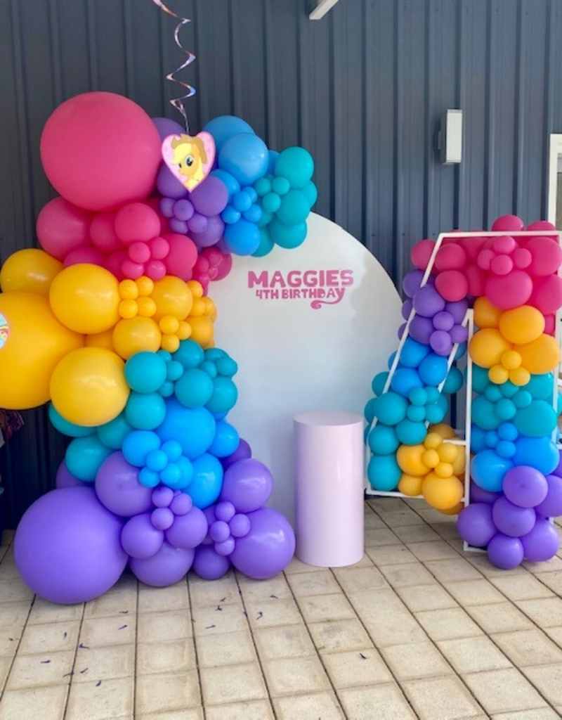 White Round Wall Backdrop with Coloured Balloons for Hire in Newcastle NSW